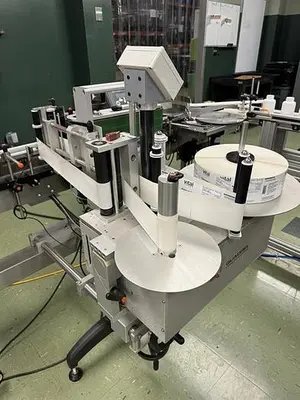 Quadrel model Moduline pressure sensitive wraparound labeler