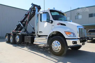 New | in-Stock 2027 PETERBILT 548 Rolloff Trucks Texas US | Roll Off Truck World #1492012