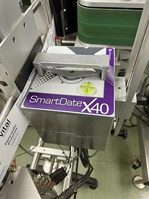 Quadrel model Moduline pressure sensitive wraparound labeler