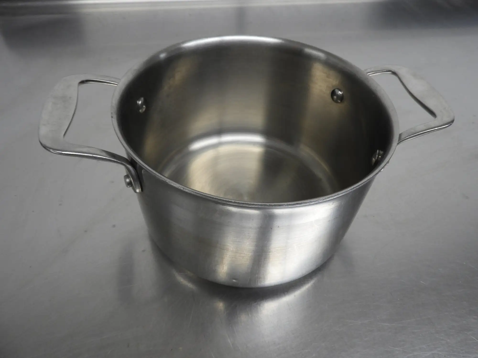 Used Golden Corral Used Tablecraft CW7004 3qt Tri Ply Sauce Pan w/ Loop Handles Pans Illinois US | Falcon Restaurant Supply #1376506