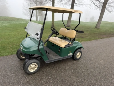 (1) 2014 E-Z-Go golf cart with a Kawasaki gas engine, includes canopy, ball carrier, fold-down winds...