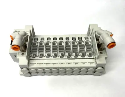 USED SMC 9-STATION PNEUMATIC MANIFOLD ASSEMBLY UNIT