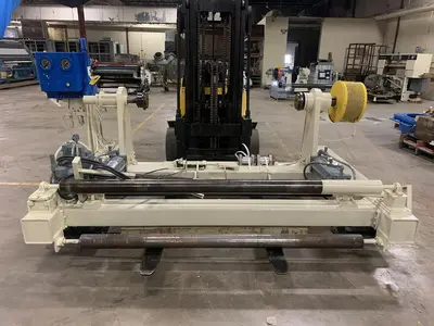 USED LEMBO SHAFTLESS FLOOR PICK UP UNWIND STAND