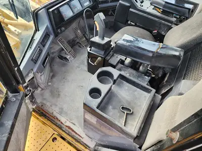 Used 2004 CATERPILLAR 990 Skid Steer Loaders British Columbia CA | Lenmark #277799
