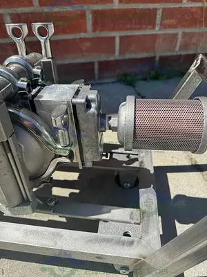 USED WILDEN HT 68004 STAINLESS STEEL DOUBLE DIAPHRAGM PUMP W/ CART