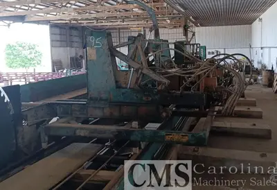 USED HELLE 3-HEAD BLOCK SAWMILL WITH VERTICAL EDGER