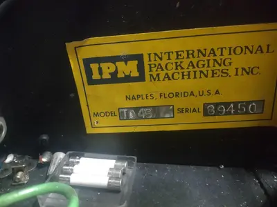 USED 1990 INTERNATIONAL PACKAGING MACHINES PALLET WRAPPER