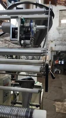 Sunshine Machinery  Vertical form fill and Seal with AMS auger filler