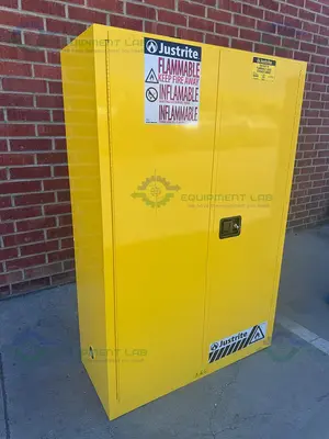 USED JUSTRITE 45 GALLON FLAMMABLE LIQUID STORAGE CABINET W/ SOFT CLOSE DOORS, KEY