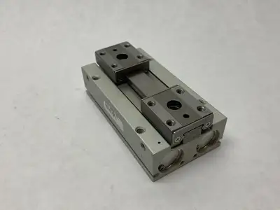 USED SMC LOW-PROFILE PNEUMATIC GRIPPER, 2-FINGER, 16MM STROKE PER JAW
