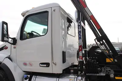 New | in-Stock 2027 PETERBILT 548 Rolloff Trucks Texas US | Roll Off Truck World #1492000