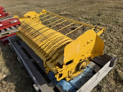 (1) approx. 5' wide pickup unit for a hay baler, unit has some damage, is listed for parts or repair...