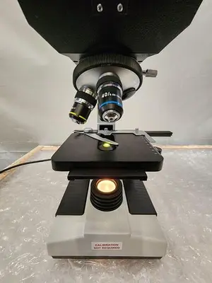 SPLIT FIELD MICROSCOPE WITH EYE PIECES, 4X4 ILLUMINATED STAGE, 3 OBJECTIVES