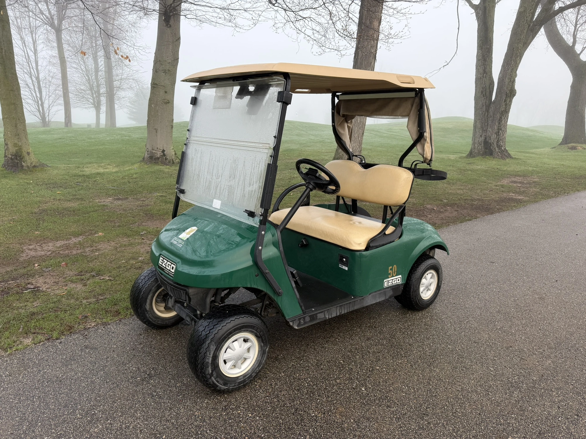 (1) 2017 E-Z-Go golf cart with a Kawasaki gas engine, model 625111G01, includes canopy, ball cover, ...