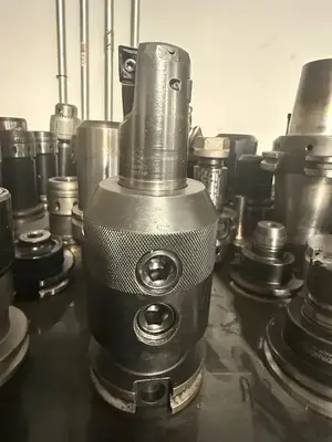 150PC CNC TOOLING LOT: CAT40/50, BT40/50, HSK63, COLLET, END MILL, SHRINK-FIT, BORING HEADS