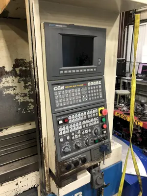 USED 1998 OKUMA MX55VB