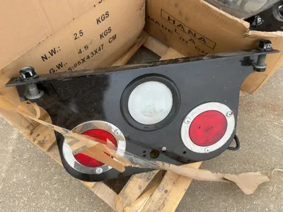 Skid of assorted truck parts included rear tail lights, (3) Sure Plus Hood Mounted Safety Mirrors, C...
