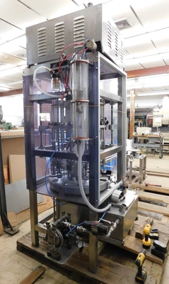 USED JG VACUUM FILLER 12 STATION