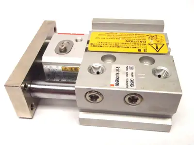 MLGPM20TN-20-B | SMC  Locking Slide Bearing Cylinder 20mm Bore 20mm Stroke - New – Open Box