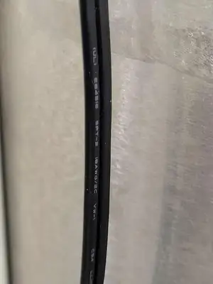 Quantum Mechanical Axial Magnetic Shield