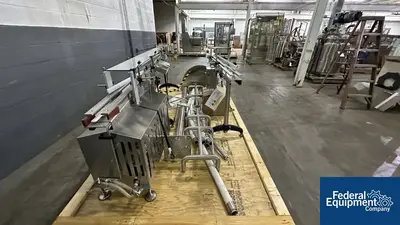 USED Capmatic Capmatic Bottle Filling Line