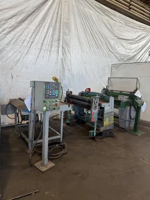 48” X 4" ARBOR STRILICH SLITTING LINE WITH FAMCO CUT OFF SHEAR & AMS CONTROLS. STOCK # 0664425