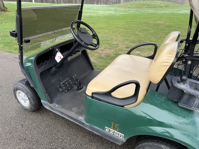 (1) 2015 E-Z-Go golf cart with a Kawasaki gas engine, includes Club canopy, ball washer, fold-down w...