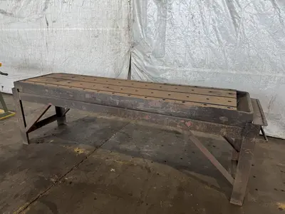28" WIDE X 84" LONG T-SLOTTED TABLE WITH STAND. STOCK # 0344325