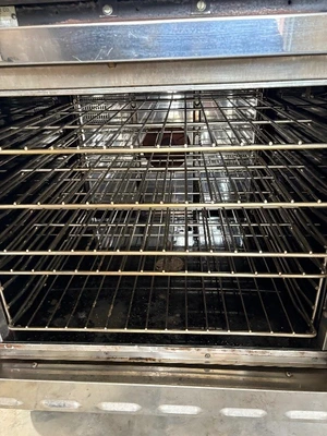 Heavy-duty commercial convection ovens in a stacked configuration