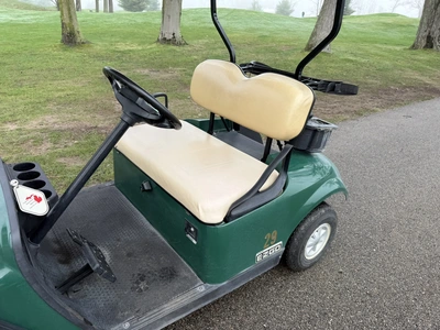 (1) 2015 E-Z-Go golf cart with a Kawasaki gas engine, includes Club Clear club and ball washer, does...