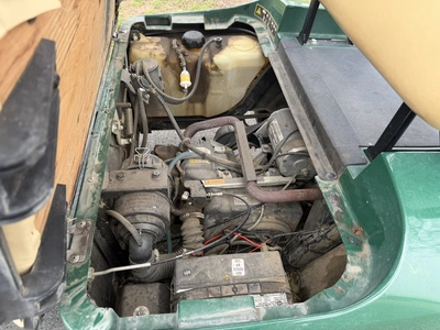 (1) 2015 E-Z-Go golf cart with a Kawasaki gas engine, includes Club Clear club and ball washer, does...
