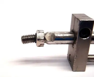 USED SMC FREE MOUNT COMPACT ACTUATOR CYLINDER W/ VACUUM 0.7