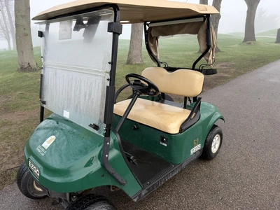 (1) 2017 E-Z-Go golf cart with a Kawasaki gas engine, model 625111G01, includes canopy, ball cover, ...