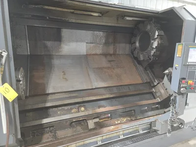 2011 Leadwell LTC-45CXL CNC Lathe w/ Tailstock and Indexer, 12 Slot Turret, Conveyor, 3-Jaw Chuck,