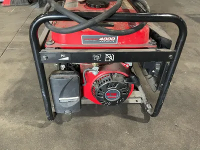USED PREDATOR 4000 WATT MAX GAS GENERATOR WITH WHEEL KIT