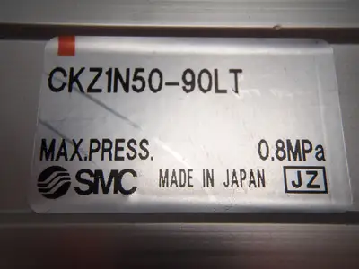 CKZ1N50-90LT | SMC  Slimline Power Clamp Cylinder 50mm Bore Left Side Arm - Used