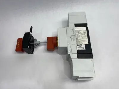 USED EATON MOLDED CASE CIRCUIT BREAKER W/ NZM2-XDV SWITCH ACCESSORY