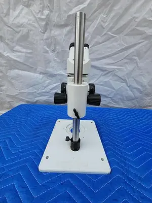 WILD HEERBRUGG MICROSCOPE WITH 2 EYEPIECES WF10X22