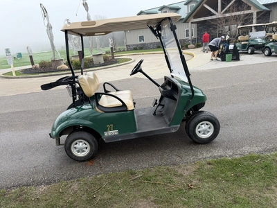 (1) 2015 E-Z-Go golf cart with a Kawasaki gas engine, does not include Club canopy, includes ball wa...