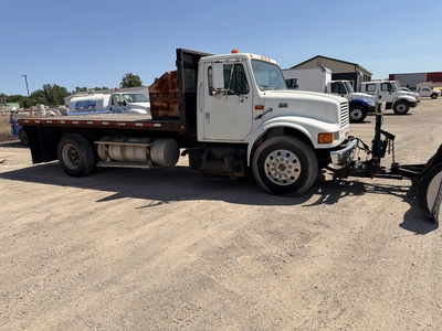 Used 1999 INTERNATIONAL 4700 4X2 WITH 10' SNOW DOGG PLOW Flatbed Trucks Michigan US | Miedema Asset Management Group #1410944