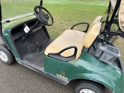 (1) 2015 E-Z-Go golf cart with a Kawasaki gas engine, includes ball washer and Club canopy, ball cov...