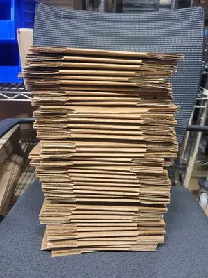 Stack of Uline 6x4x4 Corrugated Shipping Boxes S-4060