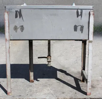 SPC7650  Miscellaneous Equipment bottle dump station Stainless Steel 39 each 1-1/4" diameter holes holes,  17 1/2"W x 39 1/2"L x 15"D