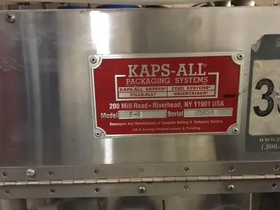 Kaps-All model F-4 cap retorquer