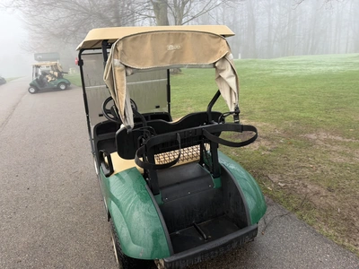 (1) 2017 E-Z-Go golf cart with a Kawasaki gas engine, model 625111G01, includes canopy, ball cover, ...