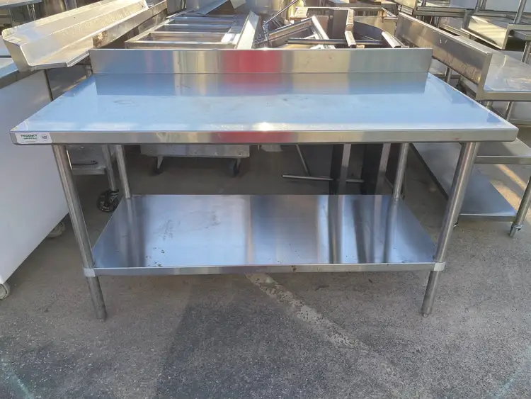 Used Regency Used Regency 30"X60" Stainless Steel Table with Shelf and 4" Backsplash JD - SS322 Food Prep Tables Illinois US | Falcon Restaurant Supply #1375170