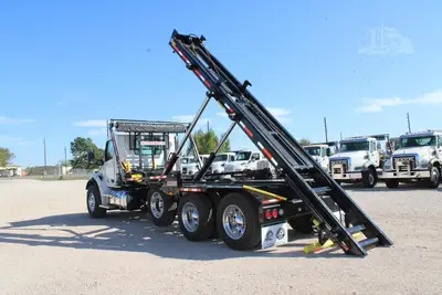 New | in-Stock 2027 PETERBILT 548 Rolloff Trucks Texas US | Roll Off Truck World #1492018