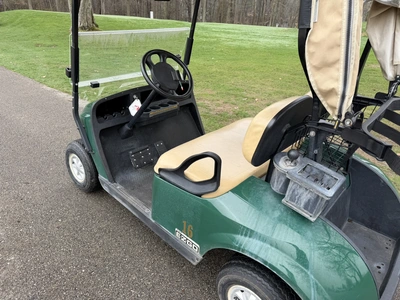 (1) 2015 E-Z-Go golf cart with a Kawasaki gas engine, includes ball washer and Club canopy, ball cov...