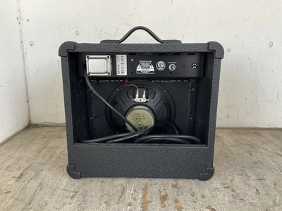 Crate XT15R speaker, a Cooper 120-347V hanging light, and a London LWINGL10001 1000W LED grow light