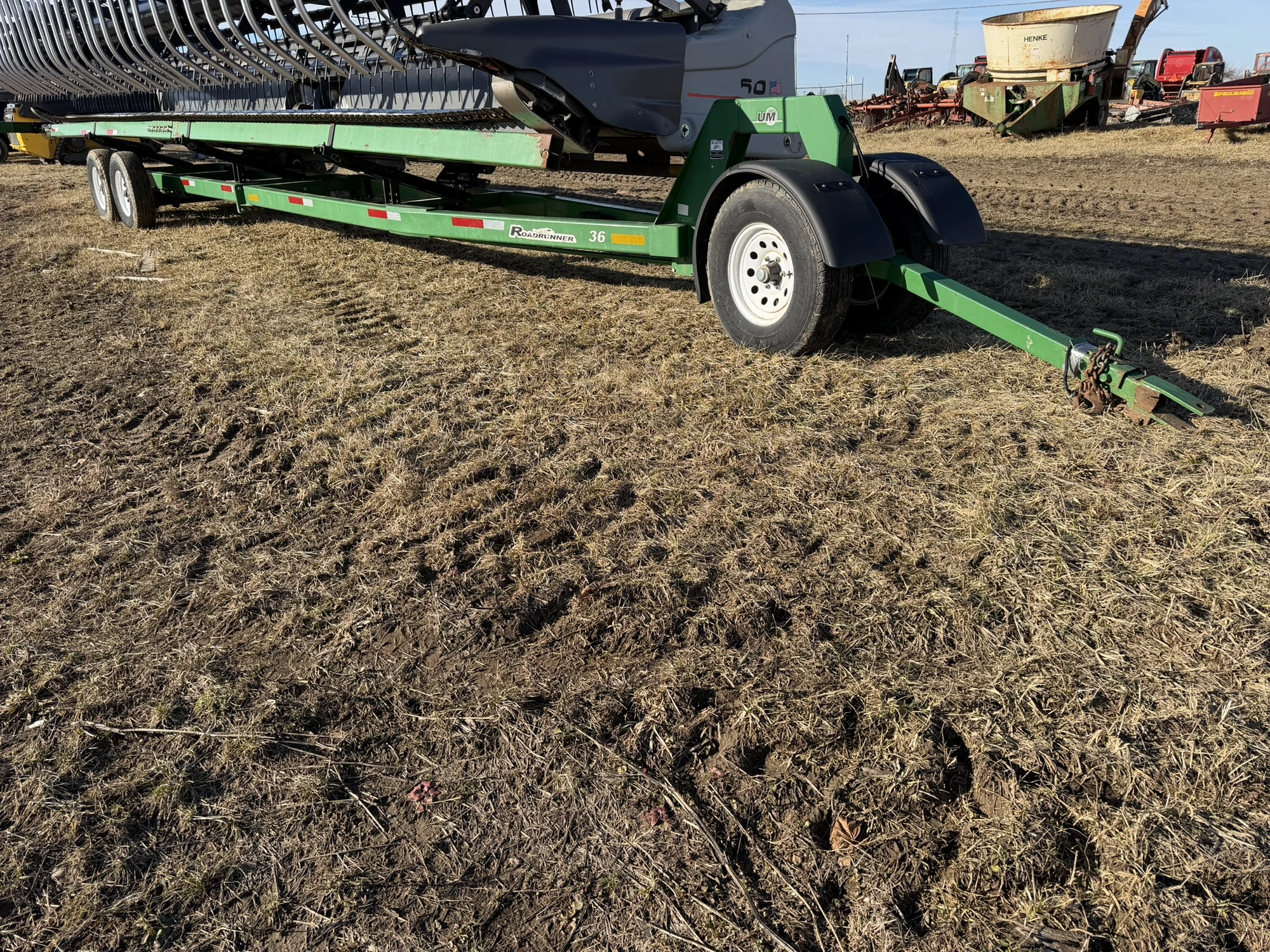 (1) Road Runner 36' dual axle header cart with pin stye hitch, size ST235/85R16 front and rear tires...